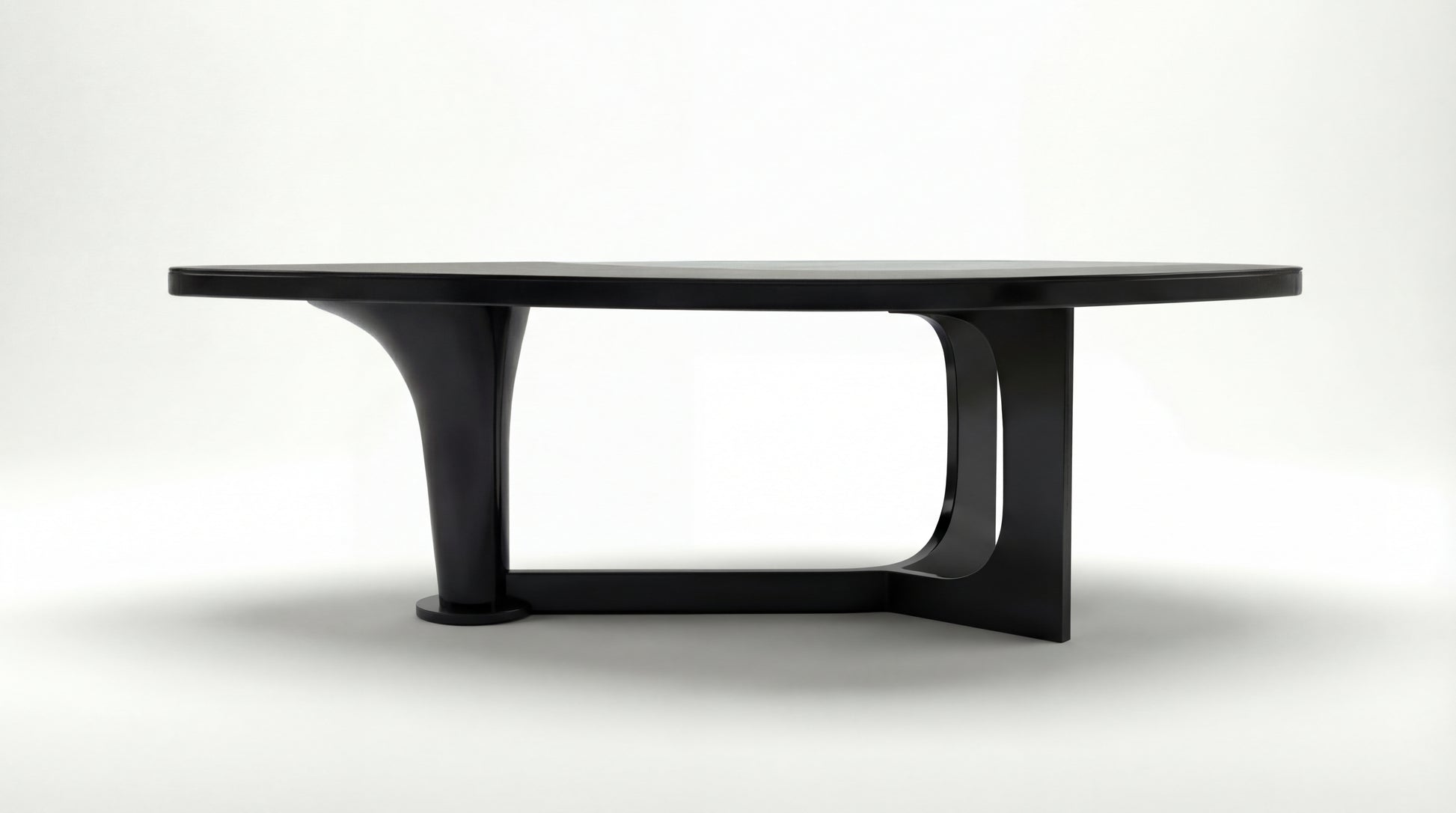 MARMO Dining Table side view showing sculptural dark wood base by NOAH Furniture