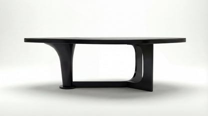 MARMO Dining Table side view showing sculptural dark wood base by NOAH Furniture