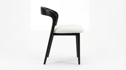 MARMO Dining Chair side view showing curved backrest and beech wood frame by NOAH Furniture
