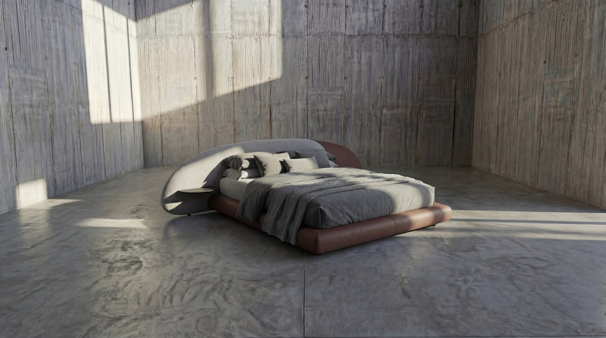 Modern bed with leather frame in a minimalistic room with wooden walls and concrete floor.