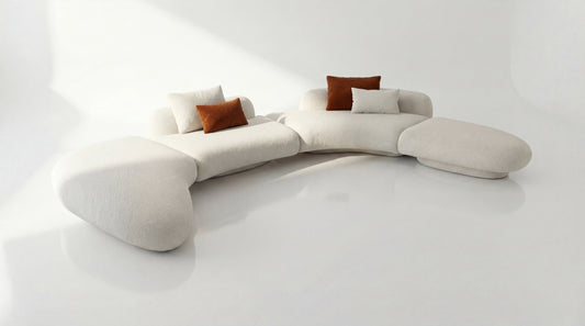 Modern white sofa with brown cushions on a white background